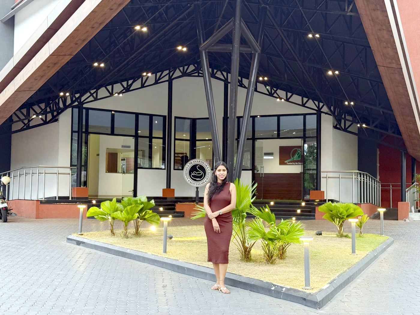 Akanksha standing outside Aksharam Museum Kottayam Kerala